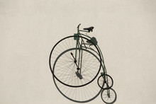 Penny-Farthing Bicycle On Wall