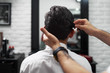 Combing process in barbershop face closeup