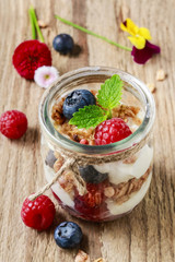 Canvas Print - Glass jar with fruits and whipped cream.