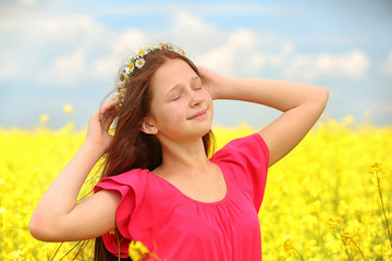 Sticker - Sweet girl in meadow with wild spring flowers