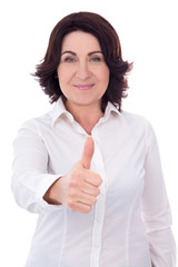 Wall Mural - portrait of beautiful mature business woman thumbs up isolated o