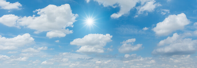Wall Mural - panorama blue sky with clouds and sun reflection. looking up view