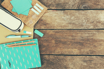 Sticker - School supplies on old wooden table, close up