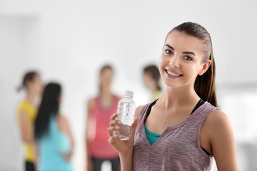 Poster - Young woman in gym