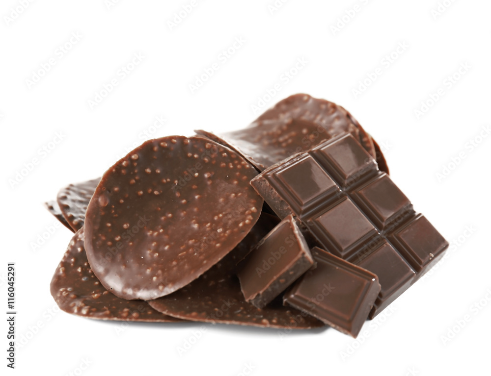 Chocolate chips and pieces on white background