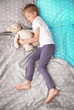 © Africa Studio - Adorable little boy sleeping with teddy bear in bed