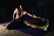 © aporubaymykh - Stretching after jogging on gym. Beautiful man and body.