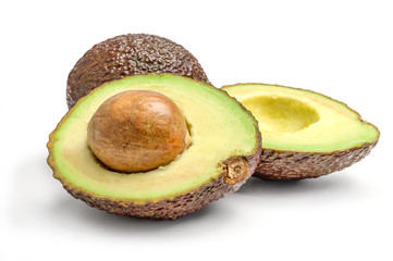 Wall Mural - Avocado halves on a white