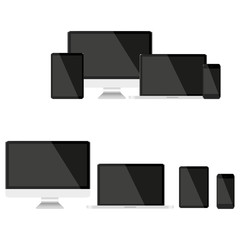 Wall Mural - set with dark screens computer notebook tablet and phone on a white background