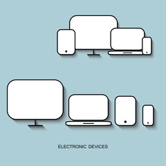 Wall Mural - set with light displays computer notebook tablet and phone on a light blue background