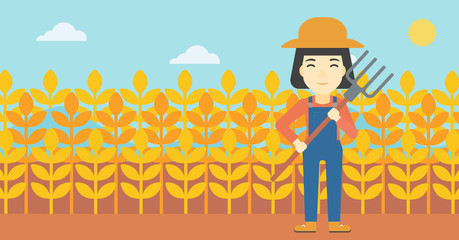 Canvas Print - Female farmer with pitchfork vector illustration.