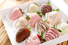 Strawberries Covered With Different Chocolate In Box On Wooden Background