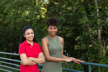 Wall Mural - 2 african american women on campus