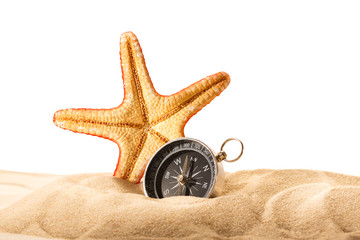 Wall Mural - Sea star and compass in sand