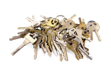 Pile of keys isolated on white background