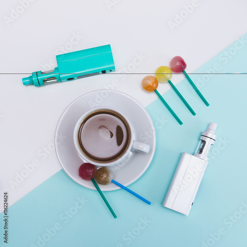 Fotografie, Tablou hipster morning with e-cigarettes and sweets