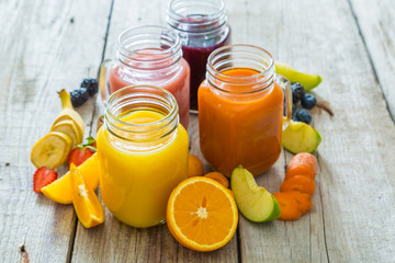 Wall Mural - Slection of fresh fruit juices in jars