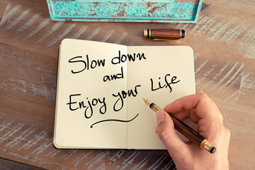 Wall Mural - handwritten text slow down and enjoy your life