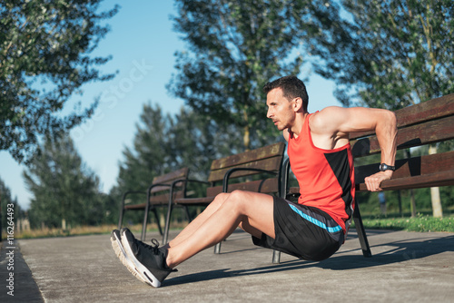 Fitness Man Doing Bench Triceps Dips During Outdoor Cross Training
