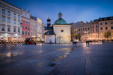 The Main Market Square In Krakow With Church Of St. Adalbert (Wojciech), Poland