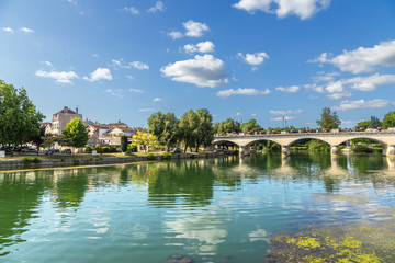 Wall Mural - cognac, france. scenic landscape with a bridge across the charente river