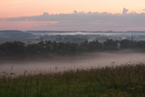 Fototapeta Natura - Morning Landscape With Dense Fog At Summer.