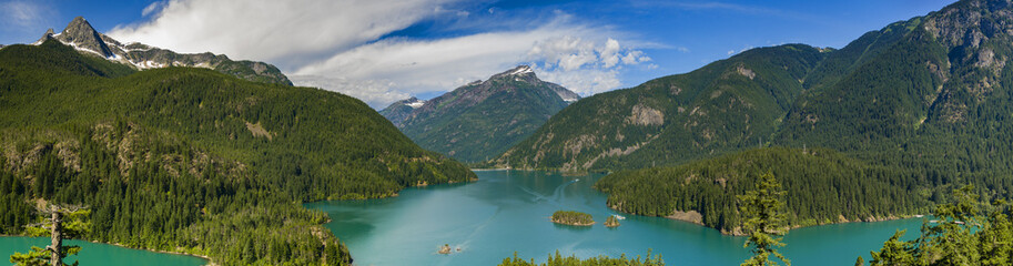 Wall Mural - Diablo Lake. Created by Diablo Dam, the lake is located between Ross Lake and Gorge Lake on the Skagit River. The unique, intense turquoise hue is from glacial rock ground to a fine powder.