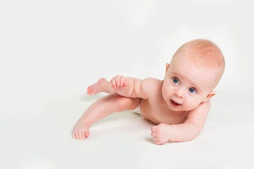 Wall Mural - Portrait of adorable baby girl isolated on white background