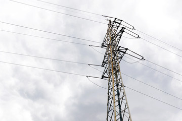 Electric pole on sky background