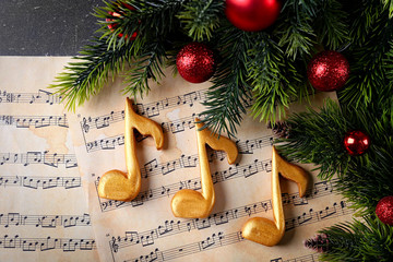 Christmas decorations on music sheets