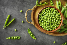 Fresh Green Peas In Bowl On Tray