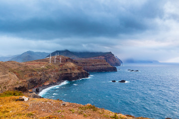  Fantastic view of the dark overcast sky. Dramatic and picturesque evening scene. Madeira, Portugal.