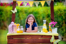 Young Girl At Her Lemonade Stand