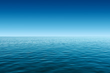 Calm Blue Sea And Gradient Blue Sky Background