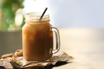 Poster - Iced coffee in glass jar on black table