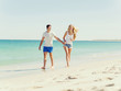 © Sergey Nivens - Romantic young couple on the beach