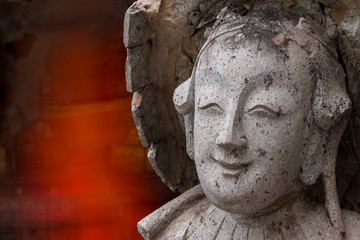 Close-ups statue the face Chinese Stone Doll.