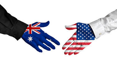 Wall Mural - Australia and United States leaders shaking hands on a deal agreement