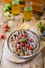 Wall Mural - Crepes with fruit and chocolate