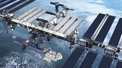 Wall Mural - flight of the international space station above the large hurricane. 3d animation.