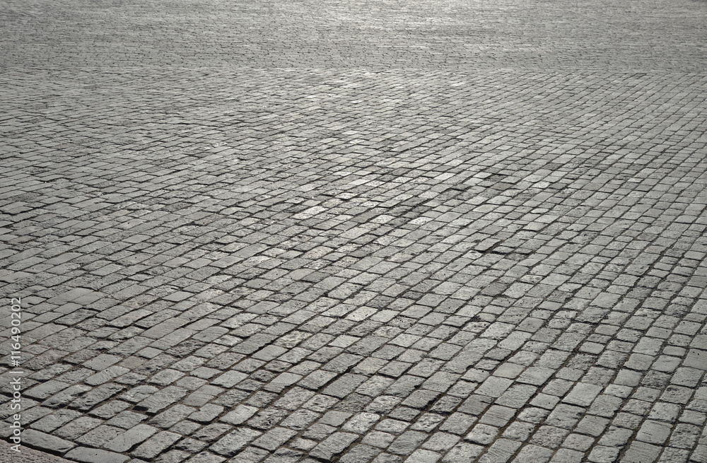 Old cobblestone pavement. - obrazy, fototapety, plakaty 