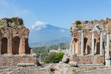 Fototapeta  - Greek theater Taormina city with a panorama at the Etna, Sicily