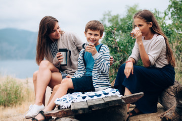 Mom with children walking outdoor