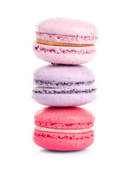 Wall Mural - Tower of colorful tasty macaroons on white background