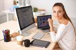 © shefkate - Young woman working in office, sitting at desk