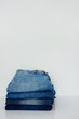 © iamtui7 - stack of clothing isolated on white, copy space