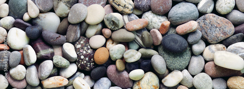 Fotografía Pebbles background. Panorama / banner