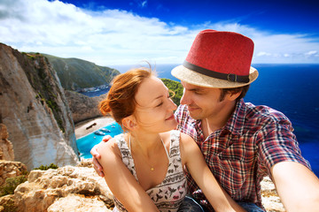 Wall Mural - Travelers on the Background Incredible Navagio Beach or Shipwreck Beach. Zakynthos, Greece.