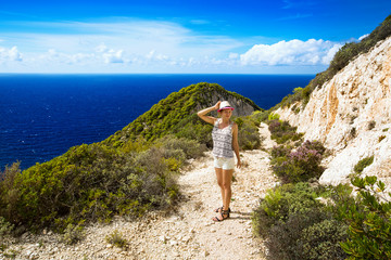 Wall Mural - Traveler on the Background Incredible Navagio Beach or Shipwreck Beach. Zakynthos, Greece.