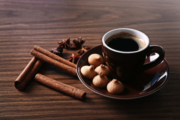 Poster - Cup of coffee with cookies on wooden table